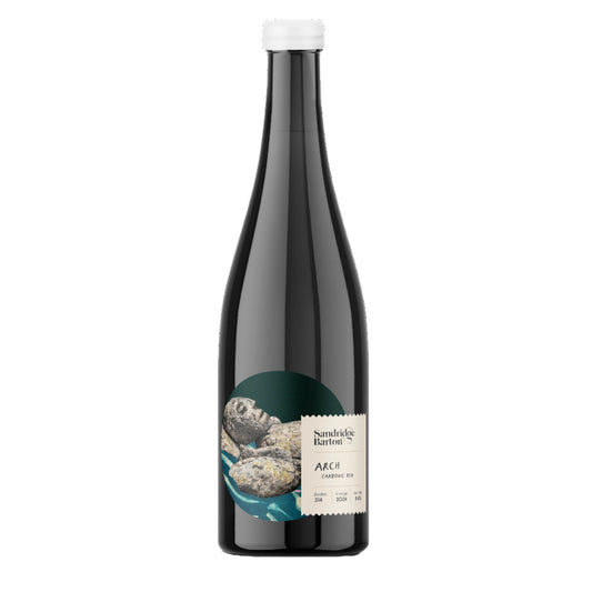Wine bottle with a label featuring rocks on a white background