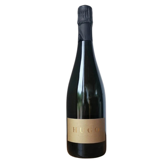 Bottle of Domaine Hugo sparkling wine, black foil with gold label.