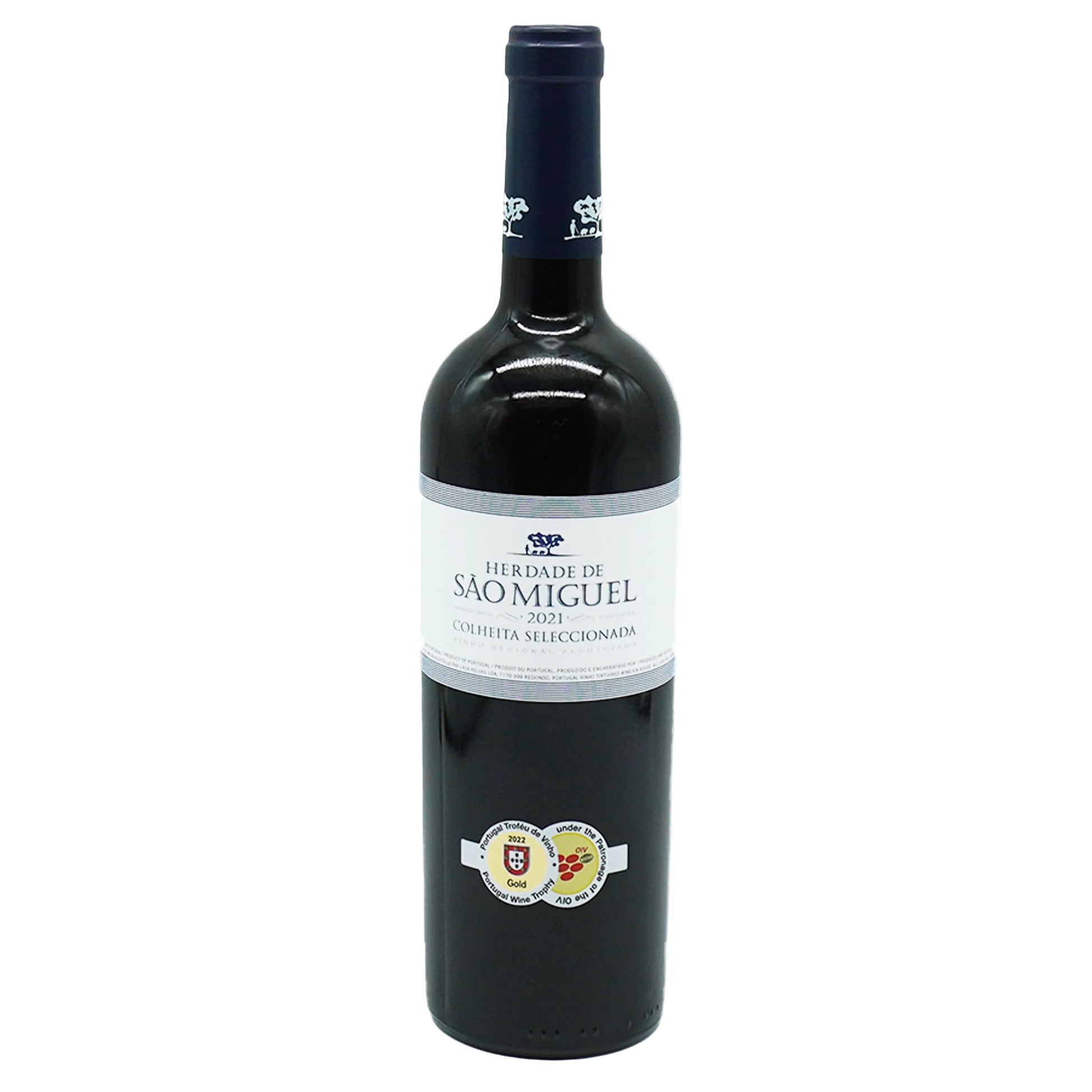 A bottle of Herdade Sao Miguel Tinto wine with a white label and decorative elements on the label, typical of a premium Portuguese wine.