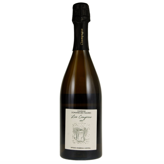 Bottle of Champagne with white label depicting the region's chalk pits