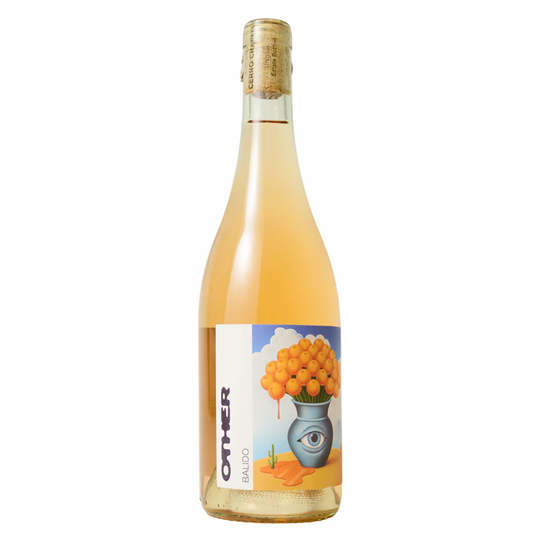 Bottle of Balido orange wine with abstract label of a bouquet of oranges in a vase.